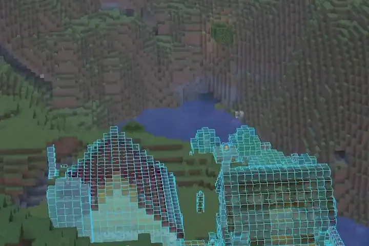 A blue see-through ghost of a ranch with a barn and a farmhouse, shown in the world before any block is placed